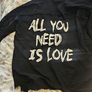 Black Graphic Jacket with White Text